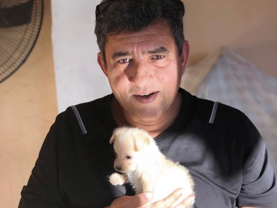 Mariano with Puppy